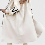 Chaqueta de Mujer Pilar con Mangas de Punto y Capucha